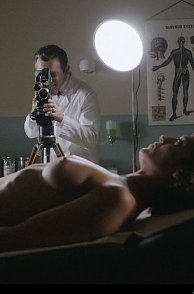 Lizzy Caplan Nude On A Table For Film