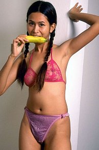 Pigtails Asian In Panties Biting A Banana Pic