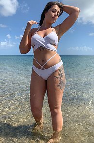 White Bikini On A Curvy Lady In Clear Waters