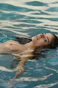 Topless Celeb Swimming In The Pool