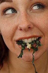 Freckled Canadian Amateur With Food In Mouth