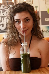 Brunette Freckle Faced Lady Enjoying Juice