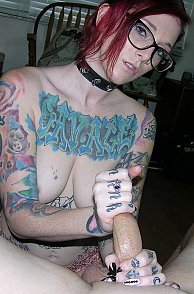 Tattooed Amateur Lady Strokes Cock