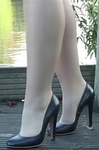 Lovely Lady In Nylons And Stiletto Heels At The Park Clips