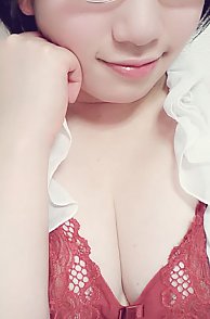 Asian Girl Showing Some Lace Bra Cleavage
