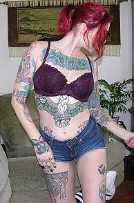 Bright Reddish Hair And Lots Of Tattoos Amateur Gets Naked