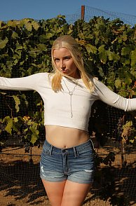 Morgan Attwood Posing Among Grape Vines