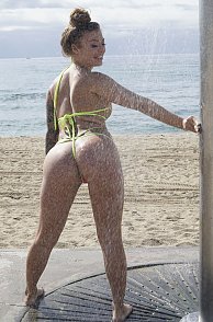 Thong Bikini Babe Rinsing Off At The Beach