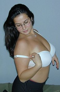 Chubby Lady In White Bra And Glasses