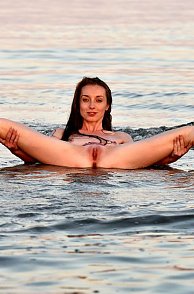 Nude Open Legs Woman In The Water